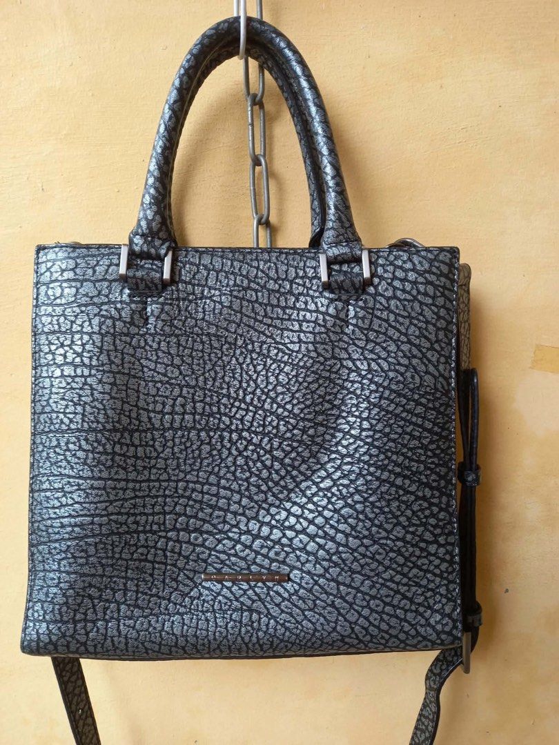 Carlyn Boxed 2 way Hand bag Sling bag (Category: Luxury Bags & Wallets) located in Naga. Submitted by happeemarket (Listing ID 1451764169, Image 2). Description: Metallic black gray Malinis #carlynbag.
