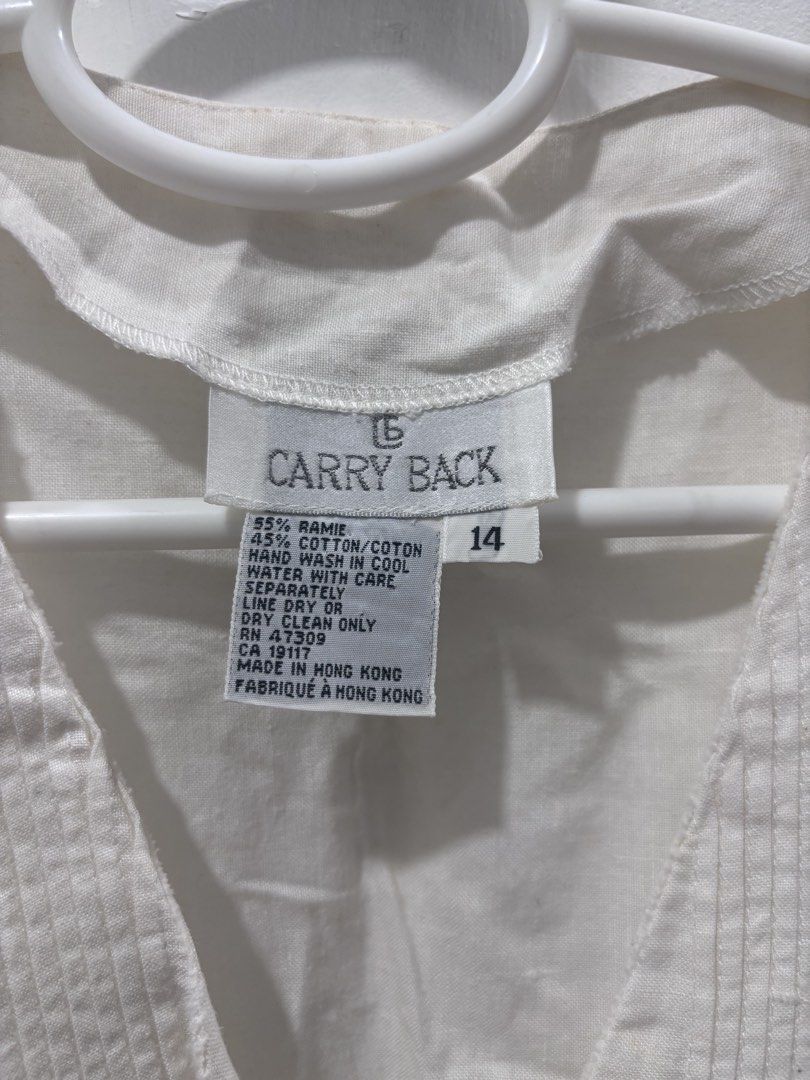Carry Back White Sleeveless V-Neck Blouse Size 14 (Category: Blouses) located in Manila. Submitted by aymbt (Listing ID 1451810818, Image 2). Description: [PLEASE READ ME] 🔻I only do same day deliveries for now po. Metro Manila areas only. Pay now, ship now (grab and lalamove). 🔻 Buyer to shoulder shipping cost. 🔻 No COD. Gcash and bank transfer payment only. ▪️pwede kong gawing free item ito kapag may iba kang binili 🫶🏻✨ ▪️linen vest type b