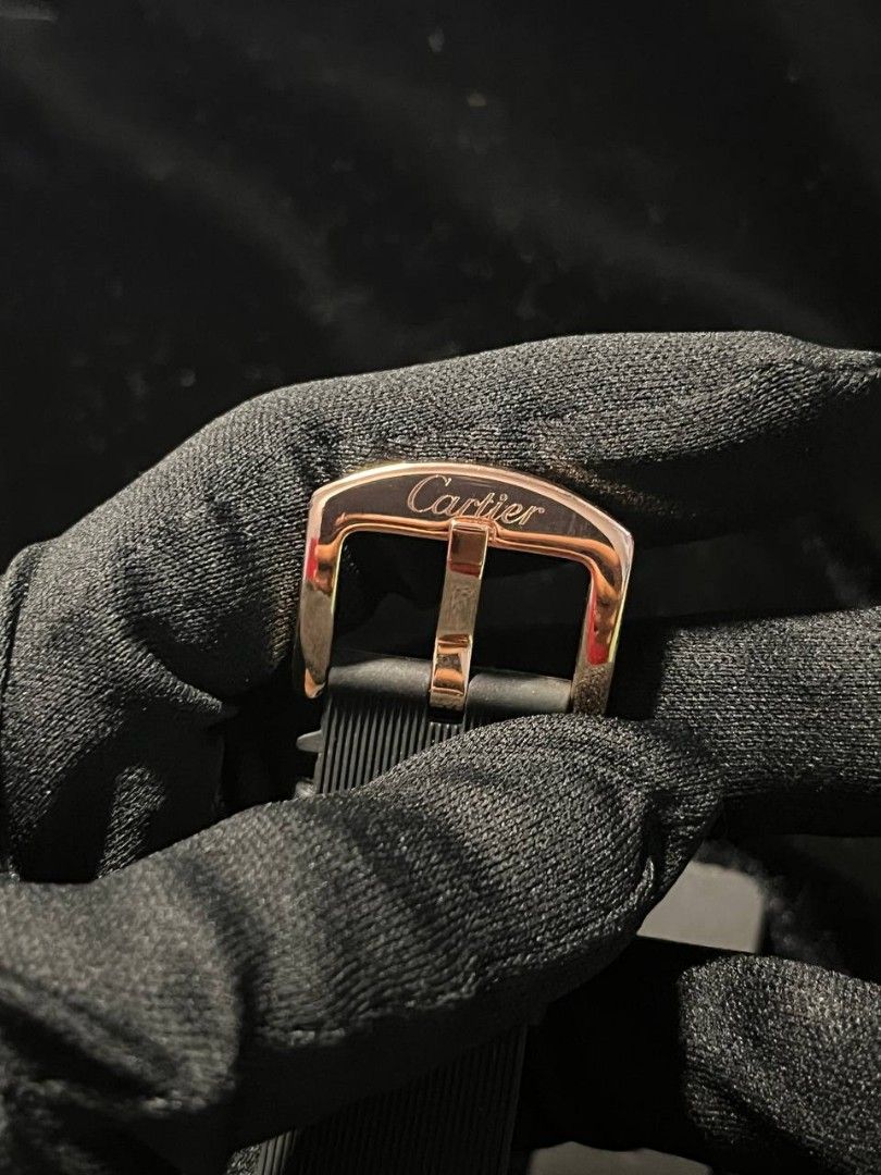 Cartier Santos 100 Rose Gold Black Dial Rubber Strap Watch (Category: Luxury Watches) located in Manila. Submitted by seannathan46011 (Listing ID 1451870607, Image 3). Description: - OEM Cartier Santos 100 Watch - Luxurious Rose Gold and Stainless Steel Case - Elegant Black Dial with Roman Numerals - Convenient Date Window at 3 o'clock - Durable Black Rubber Strap - Rose Gold Buckle with Cartier Engraving - Water Resistant up to 100 Meters .