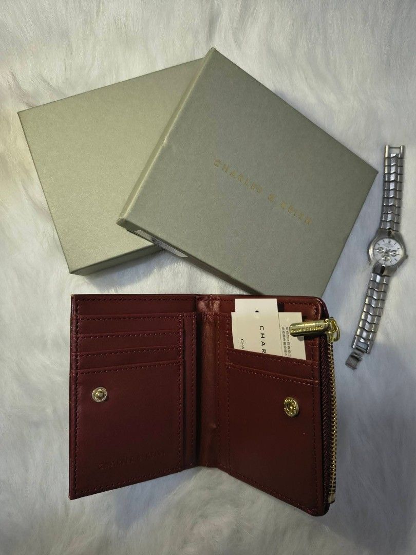Charles and Keith Burgundy Wallet (Category: Wallets & Card holders) located in Batangas. Submitted by braxielyn_xen (Listing ID 1451811695, Image 2). Description: .