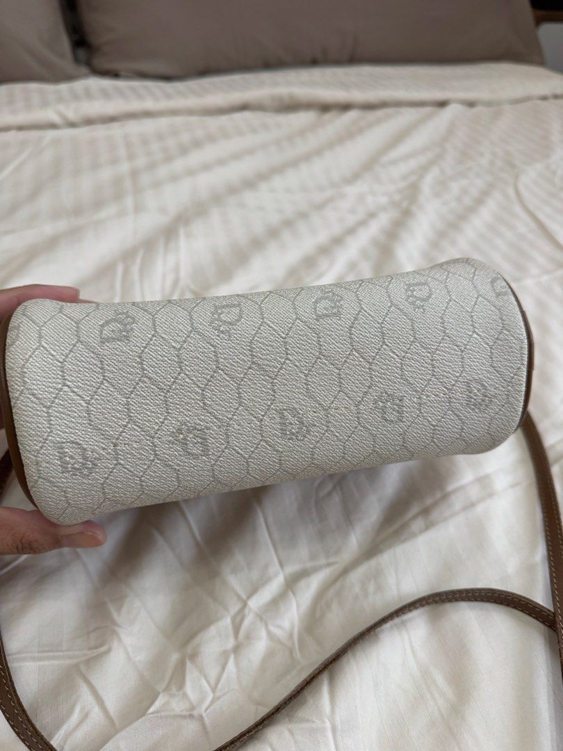 Christian Dior Monogram Canvas Crossbody Bag (Category: Luxury Bags & Wallets) located in Quezon City. Submitted by pinkpracticalmom (Listing ID 1451753536, Image 2). Description: - Authentic vintage Christian Dior crossbody bag - Iconic Diorissimo monogram pattern (white & brown) - Brown leather trim and strap - Secure zipper closure Dimension- 22cm width x 17cm height. 60cm strap drop. No inclusions..