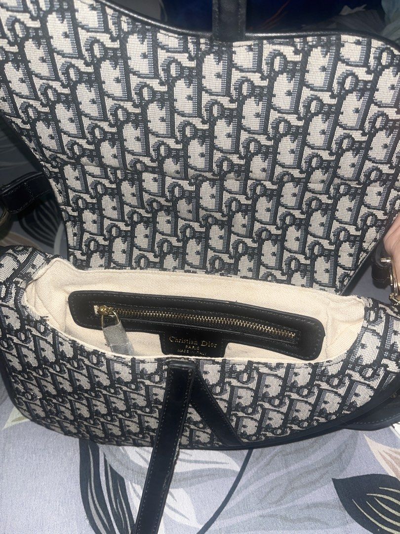 Christian Dior Saddle Bag with Strap (Category: Cross-body Bags) located in Manila. Submitted by srn_rjv (Listing ID 1451834088, Image 3). Description: Secondhand bag Not worn out Barely used No box Replica.