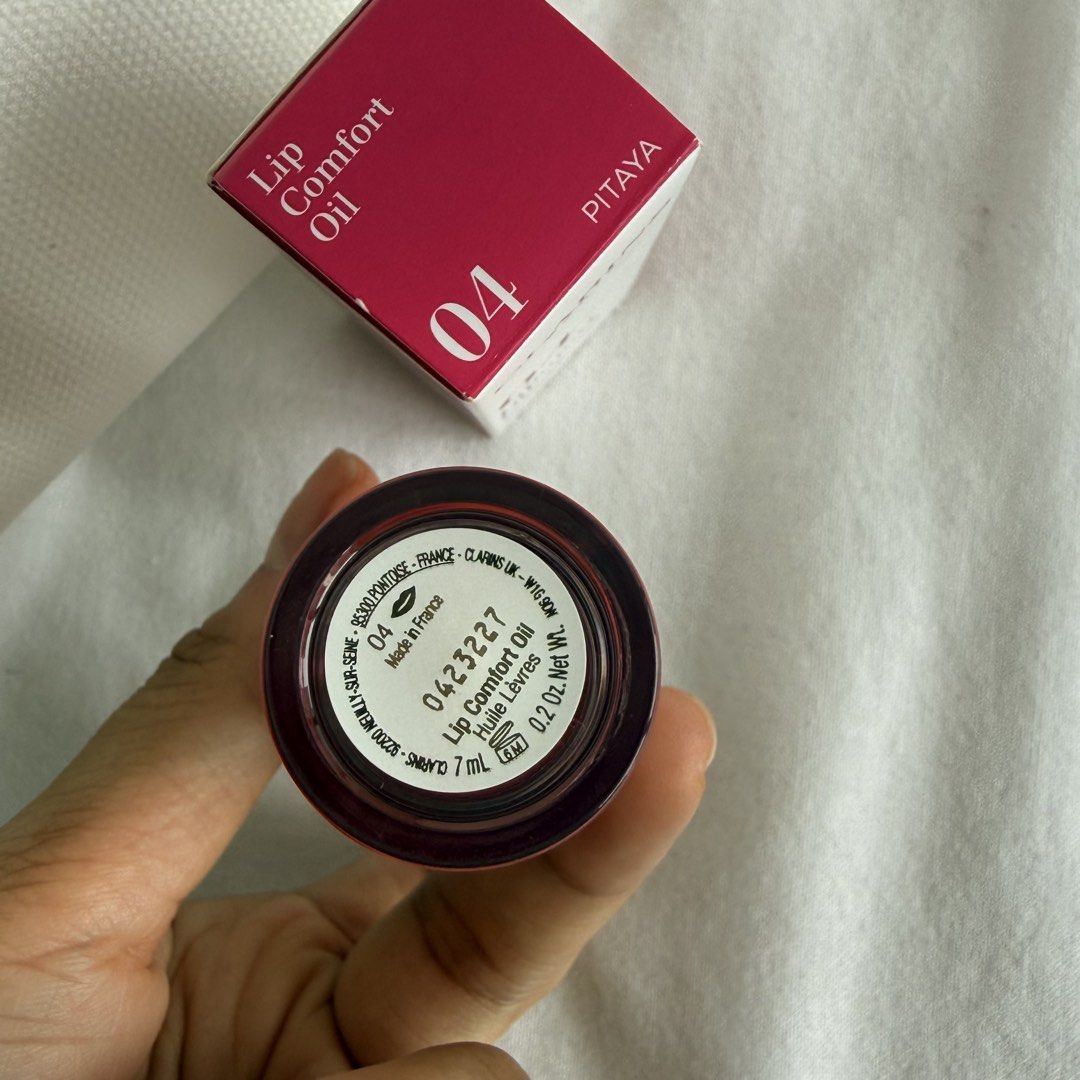 Clarins lip Oil (Category: Makeup) located in Manila. Submitted by kylieolarte (Listing ID 1451752052, Image 3). Description: Clarins Lip Comfort Oil in shade 04 Pitaya is one of the viral holy-grail lip oils on the market! * Shade: 04 Pitaya (Sheer pop of dragon fruit / baby pink). * Key Feature: It is a pH-reactive shade. It looks like a bright pink in the bottle, but once applied, it adapts to the natural pH of the lips to create a custom, ros