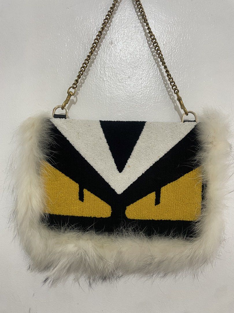 Clutch Bag with Fur Trim (Category: Luxury Bags & Wallets) located in Manila. Submitted by gflores (Listing ID 1451740807, Image 1). Description: Similar to Fendi Monster Eyes Clutch Bag with Fur Trim. Can fit phone and small wallet. delivery through riders (lalamove, grab etc) pickup,BOOKING ARE MADE BY BUYER. NO TO LOWBALLERS. 1 DAY RESERVATION ONLY Pls note that all items are preloved so kindly manage your expectations, but rest assured that a