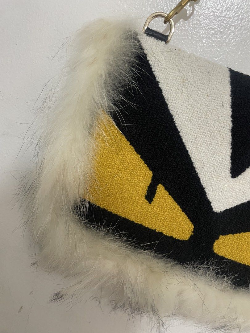 Clutch Bag with Fur Trim (Category: Luxury Bags & Wallets) located in Manila. Submitted by gflores (Listing ID 1451740807, Image 3). Description: Similar to Fendi Monster Eyes Clutch Bag with Fur Trim. Can fit phone and small wallet. delivery through riders (lalamove, grab etc) pickup,BOOKING ARE MADE BY BUYER. NO TO LOWBALLERS. 1 DAY RESERVATION ONLY Pls note that all items are preloved so kindly manage your expectations, but rest assured that a