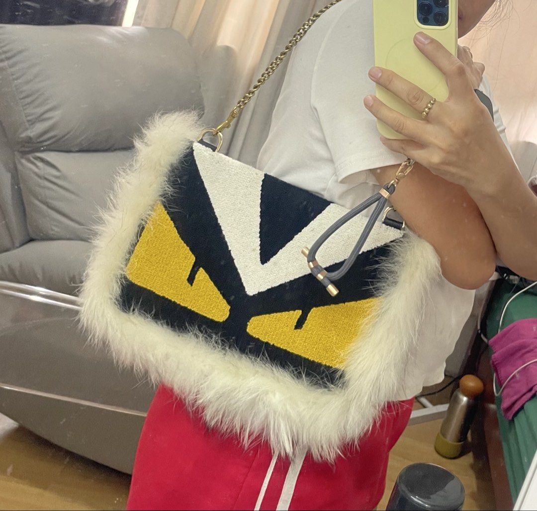 Clutch Bag with Fur Trim (Category: Luxury Bags & Wallets) located in Manila. Submitted by gflores (Listing ID 1451740807, Image 2). Description: Similar to Fendi Monster Eyes Clutch Bag with Fur Trim. Can fit phone and small wallet. delivery through riders (lalamove, grab etc) pickup,BOOKING ARE MADE BY BUYER. NO TO LOWBALLERS. 1 DAY RESERVATION ONLY Pls note that all items are preloved so kindly manage your expectations, but rest assured that a