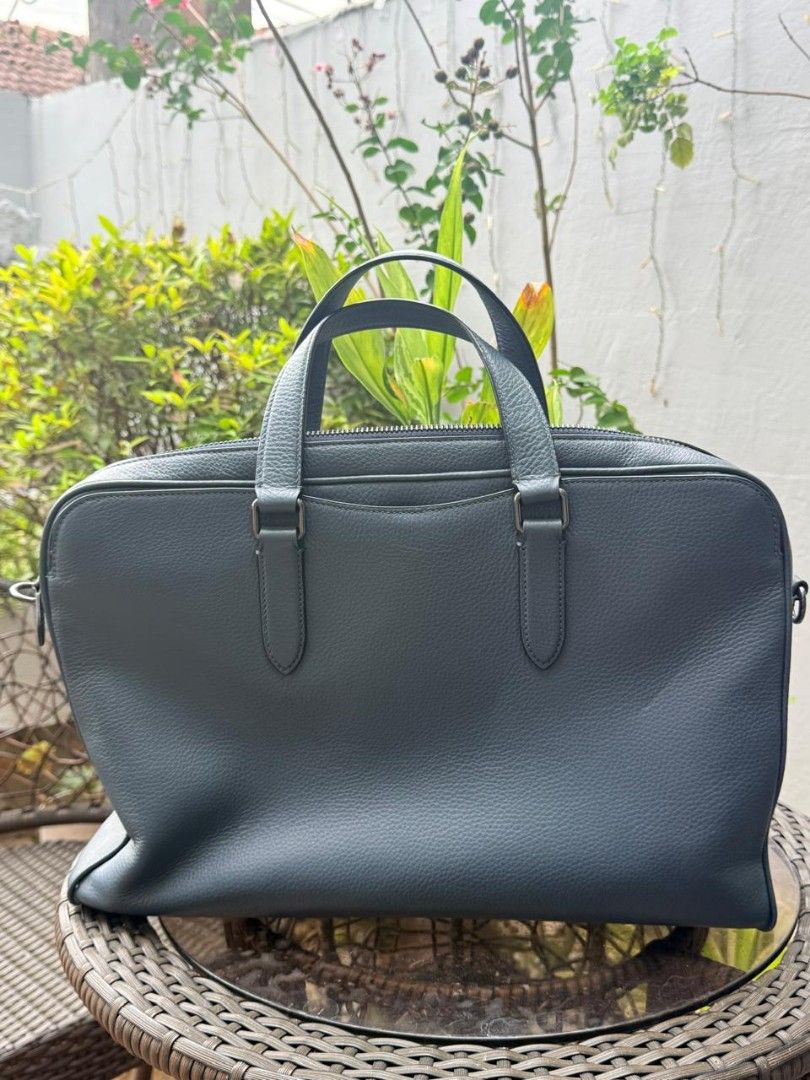 Coach Briefcase (Category: Luxury Bags & Wallets) located in Makati City. Submitted by larasdowry (Listing ID 1451898175, Image 2). Description: Original Bag with Sling. Lots of pckets inside Php 6,000.