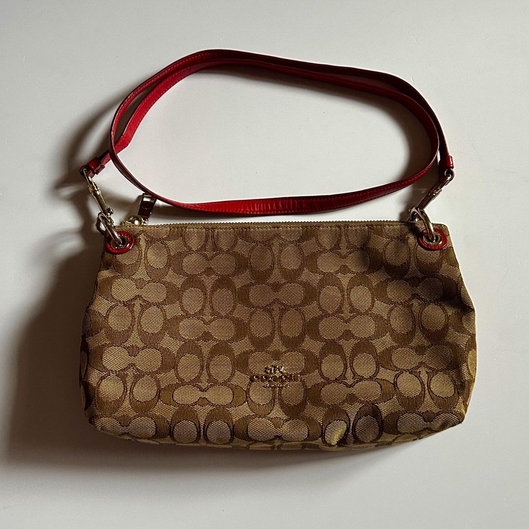 Coach Crossbody Bag with Monogram Logo (Category: Luxury Bags & Wallets) located in Manila. Submitted by lene_ (Listing ID 1451773953, Image 1). Description: •Paint stain underneath • Just needs a light cleaning • Interior condition: 11/10 – looks brand new • No stains or marks inside 📦 Shipping • Delivery fee will be shouldered by the buyer. • Can ship via J&T Express, Lalamove, Grab, or your preferred courier. Feel free to message me if you ha
