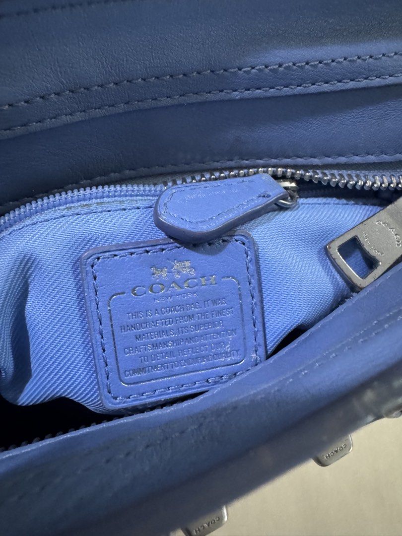 Coach Swagger 20 Pebble Leather Handbag (Category: Luxury Bags & Wallets) located in Malolos. Submitted by urban_thrift_09 (Listing ID 1451844809, Image 3). Description: - Coach Swagger 20 bag - Color: Light Blue, marbled - Material: Pebble Leather - Features: Top handles, detachable crossbody strap - Hardware: Silver-tone - Interior: Zip pocket - Versatile for everyday or special occasions - Classic Coach design.