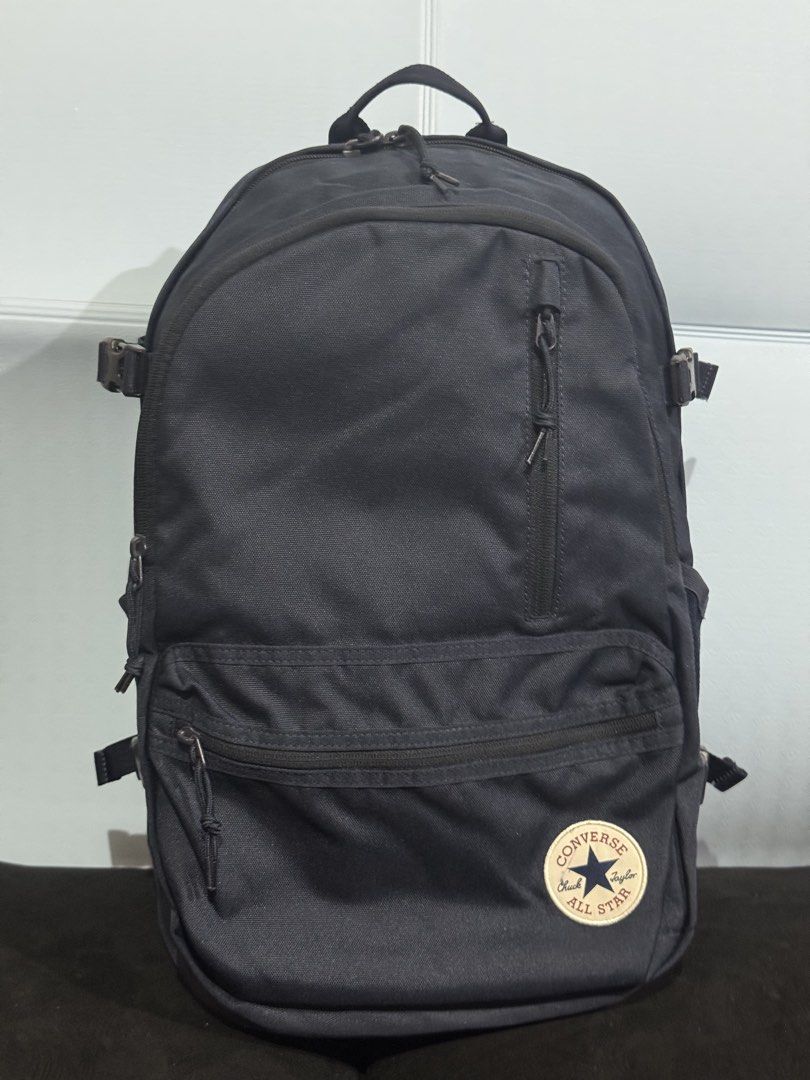 Converse All Star Navy Blue Backpack (Category: Backpacks) located in Rodriguez. Submitted by leo_mjjmpj (Listing ID 1440774294, Image 2). Description: - Navy blue Converse backpack - Multiple zip pockets on the front - Side mesh pockets for water bottles or essentials - Adjustable straps for a comfortable fit - Plenty of interior space - Ideal for school, work, or everyday adventures.