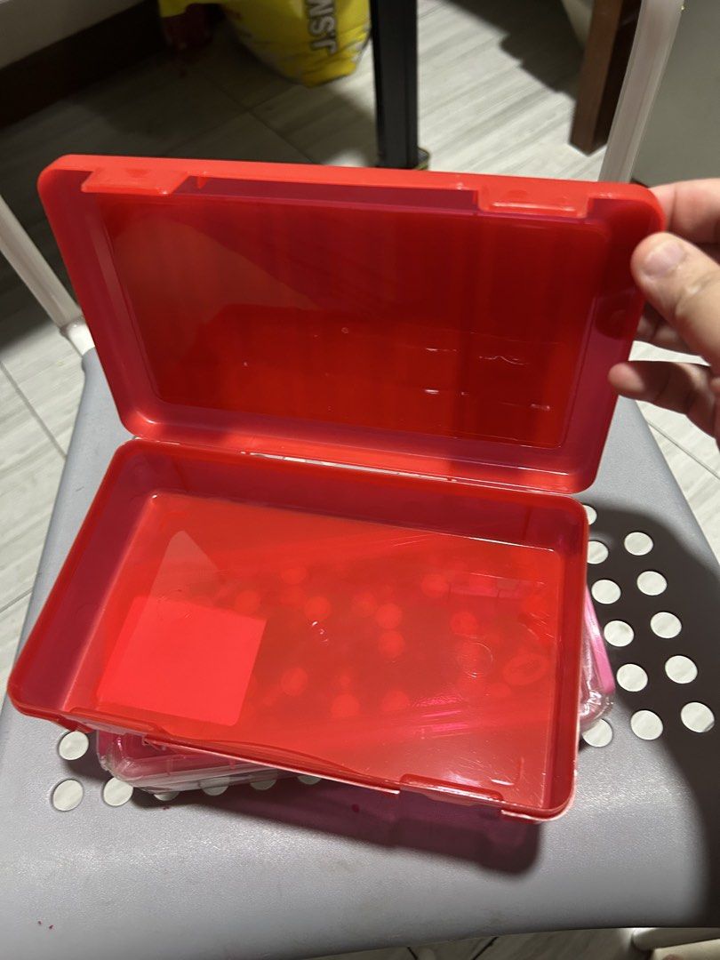 Crayola Storage Case Red and Pink (Category: Stationery & School Supplies) located in Paranaque City. Submitted by allthatclutterph (Listing ID 1451839840, Image 2). Description: - Set includes two Crayola storage cases. - One case is bright red with a sturdy plastic construction and hinged lid. - The second case is pink and also features a hinged lid. - Pink case has a colorful sticker on the lid depicting crayons. - Ideal for organizing art sup