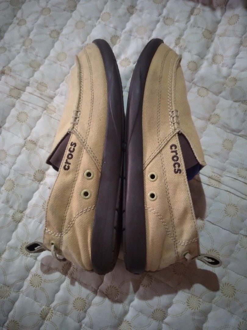 Crocs Canvas Slip-On Khaki Brown Men (Category: Casual Shoes) located in Zamboanga. Submitted by nurbya898048 (Listing ID 1451897167, Image 3). Description: - Comfortable Crocs canvas slip-on shoes/Loafer - Tan/khaki brown color - Easy to wear for casual outings - Dark brown soles - Features Crocs logo on the side - Perfect for everyday use Details; In good condition Color rate 9.5/10 or better Presentable, no flaws See all photos for details Siz