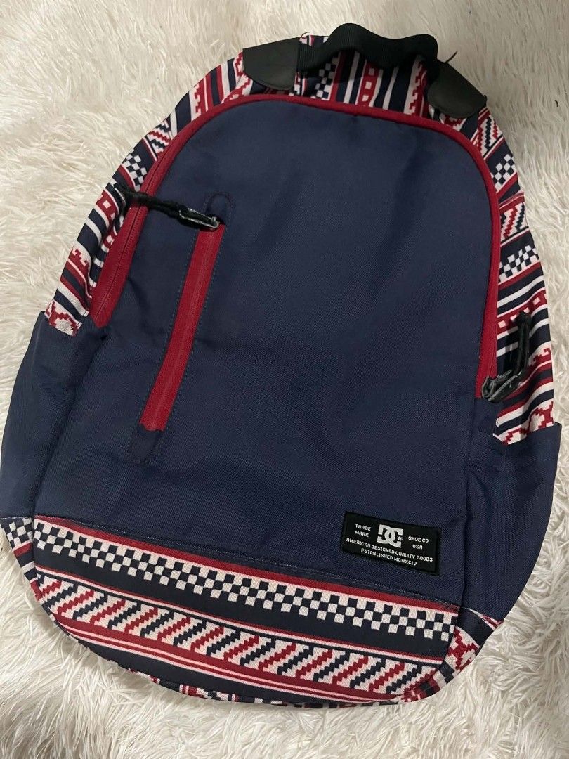 DC Shoes Backpack Navy Blue Tribal Pattern (Category: Backpacks) located in Manila. Submitted by senggggg. (Listing ID 1451832854, Image 2). Description: good condition working zip sign of use check details and size.