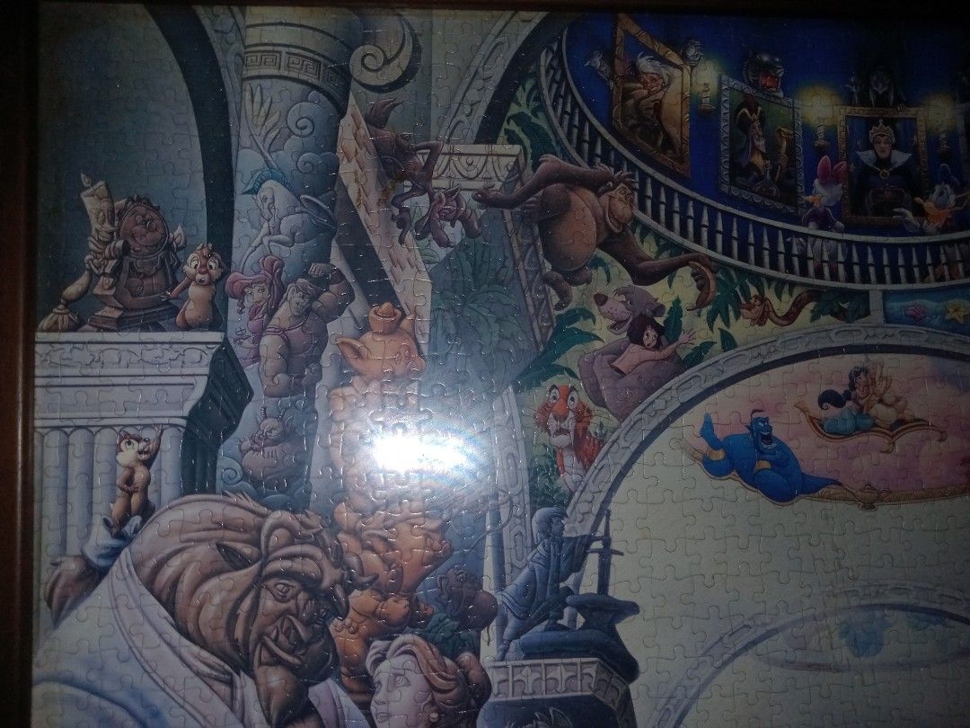 Disney Characters Jigsaw Puzzle - Large (Category: Board Games & Puzzles) located in Baguio. Submitted by loweasel (Listing ID 1451716504, Image 2). Description: - Huge framed Disney jigsaw puzzle - Features classic characters: Mickey, Minnie, Beast, Belle, Ariel, Aladdin, Peter Pan, and many more! - Ideal for Disney fans and puzzle lovers - Comes framed and ready to hang - Perfect for game rooms or kids' rooms.