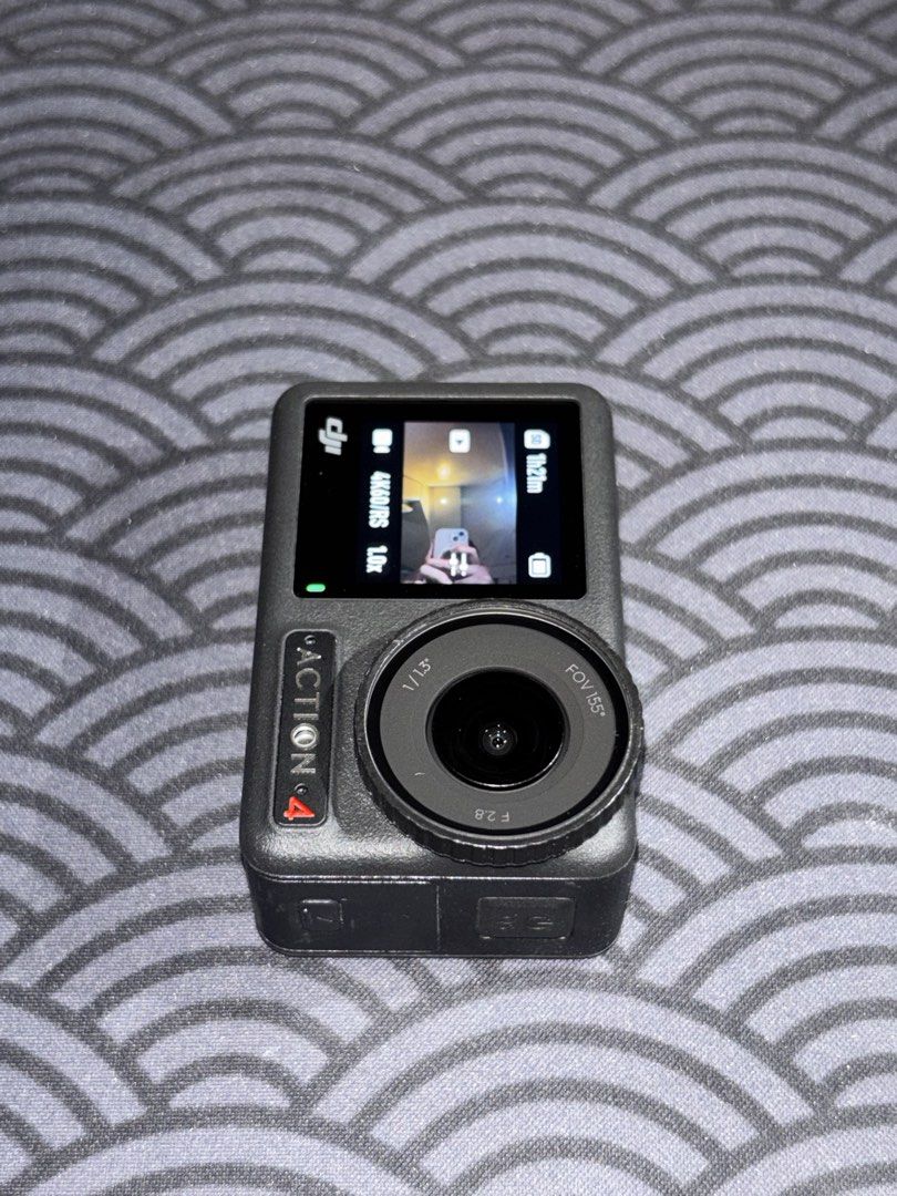 DJI OSMO ACTION 4 (STANDARD COMBO) (Category: Video Cameras) located in Manila. Submitted by fiercefish_179572 (Listing ID 1451860890, Image 3). Description: - I still have the whole accessories and box - Used for 3 months - RFS upgrading .