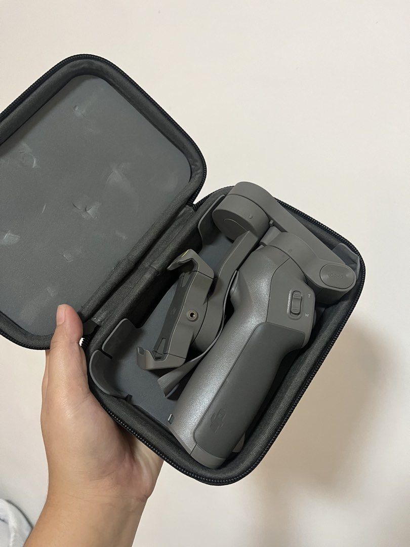 DJI Osmo Mobile 3 Combo Gimbal Stabilizer (Category: Gimbals & Stabilizers ) located in Bulacan. Submitted by meekeniee (Listing ID 1451813361, Image 2). Description: DJI Osmo Mobile 3 Combo – Never Used** Selling my DJI Osmo Mobile 3 Combo in brand new, never used condition. It has never been used and is in excellent condition. Perfect for capturing smooth, stabilized videos for vlogging, travel, content creation, and everyday use. Includes: * D