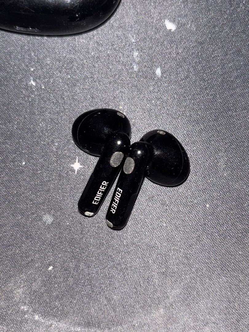 EDIFIER W220T EARBUDS (right earbud not working) (Category: Earphones) located in Manila. Submitted by buttfingerer5000 (Listing ID 1451742564, Image 3). Description: Edifier W220T. Left earbud and charging case work perfectly. Right earbud is water damaged and does not power on. Selling for parts or if you only need the left earbud/case..