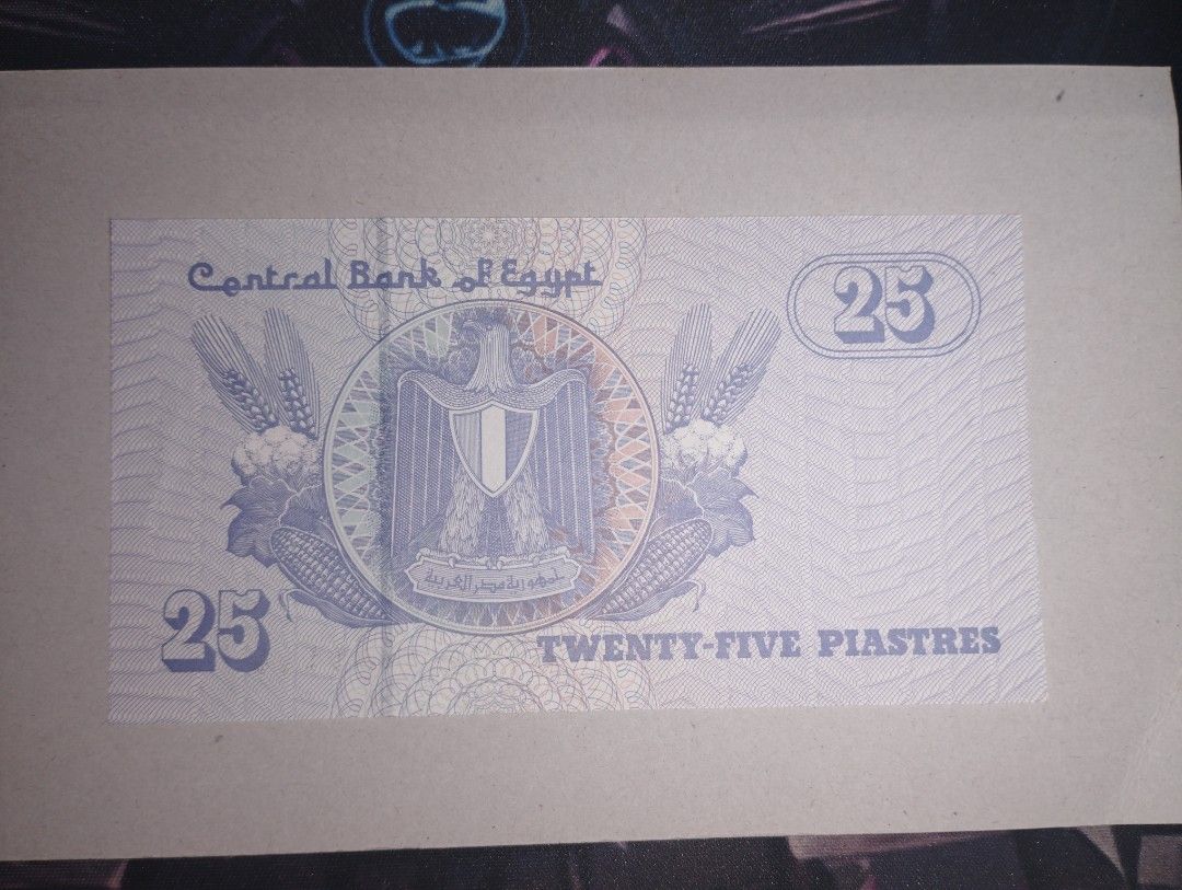 Egypt 25 Piastres (Category: Currency) located in Baguio. Submitted by maximum_carnage (Listing ID 1451799805, Image 1). Description: - Authentic Egyptian 25 piastres banknote - Features the Egyptian coat of arms on the front - Depicts a mosque on the back - Ideal for coin and banknote collectors - Serial numbers clearly visible.