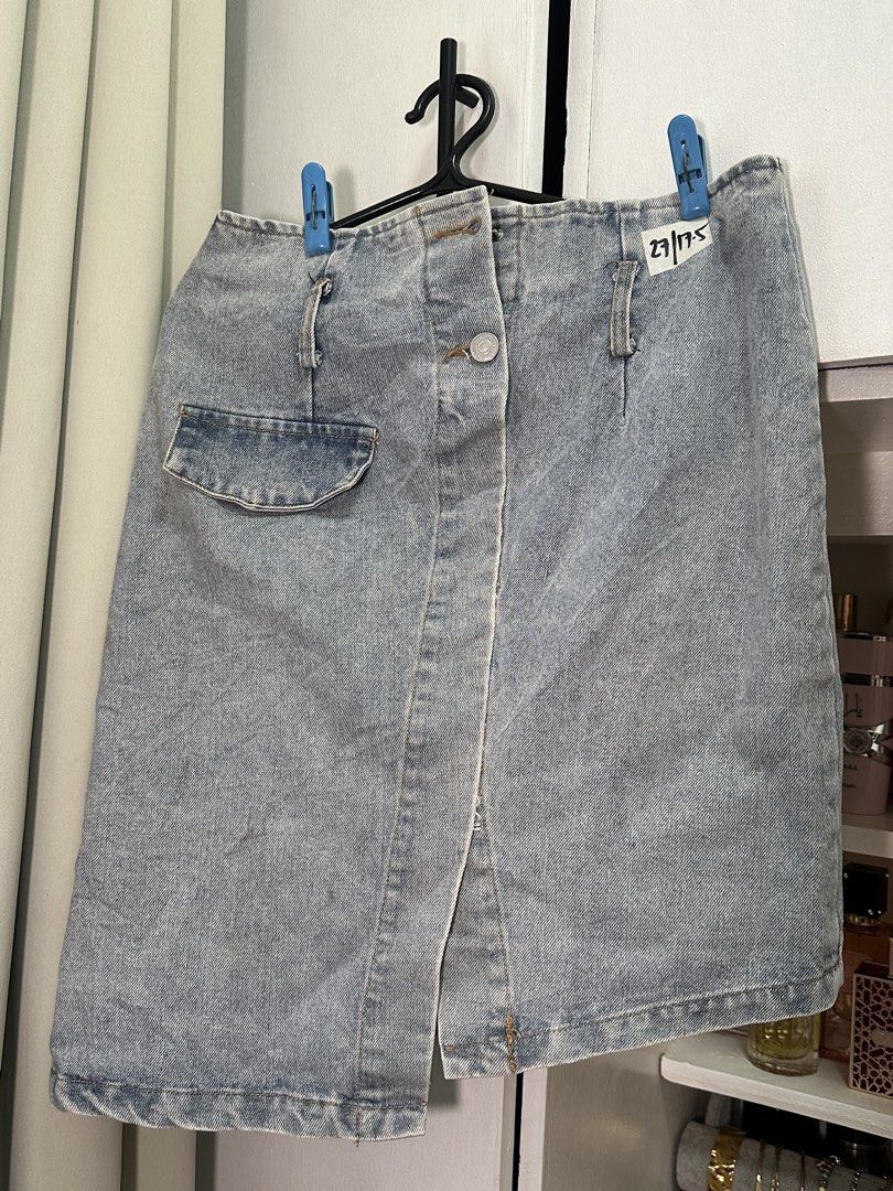 [Free] Denim Midi Asymmetrical Skirt (Category: Skirts) located in Quezon City. Submitted by katdeclutters (Listing ID 1451771934, Image 1). Description: You can get this for free if you're getting at least 1 item from my listings. Size 27 | Length 17.5" Missing 1 button.