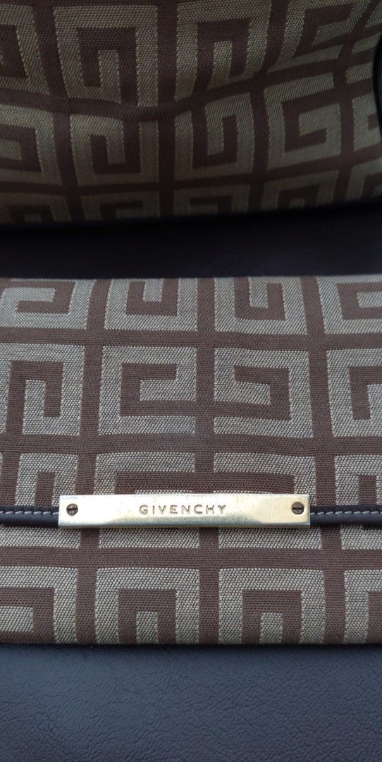 Givenchy Canvas Monogram Tote Bag and Wallet Set (Category: Luxury Bags & Wallets) located in Makati City. Submitted by heinzly (Listing ID 1451896646, Image 2). Description: - Givenchy monogram canvas tote bag and matching wallet - Color: Brown and beige - Tote features leather trim and handles - Zipper closure on the tote bag - Wallet has a gold-tone clasp and interior card slots - Ideal for everyday use BAG AND WALLET SET These bag and wallet 