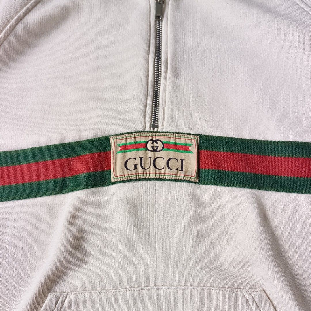 Gucci Half-Zip Hoodie (Category: Luxury Apparel) located in Banaue. Submitted by radical.thrift (Listing ID 1451717946, Image 2). Description: Gucci Halfzip Hoodie •it features the brand's iconic green & red stripe details with a vintage logo label •best fit to adult sizes small-medium men's or large women's (20W 26.5L) •good as new condition •authentic ₱2500 only.