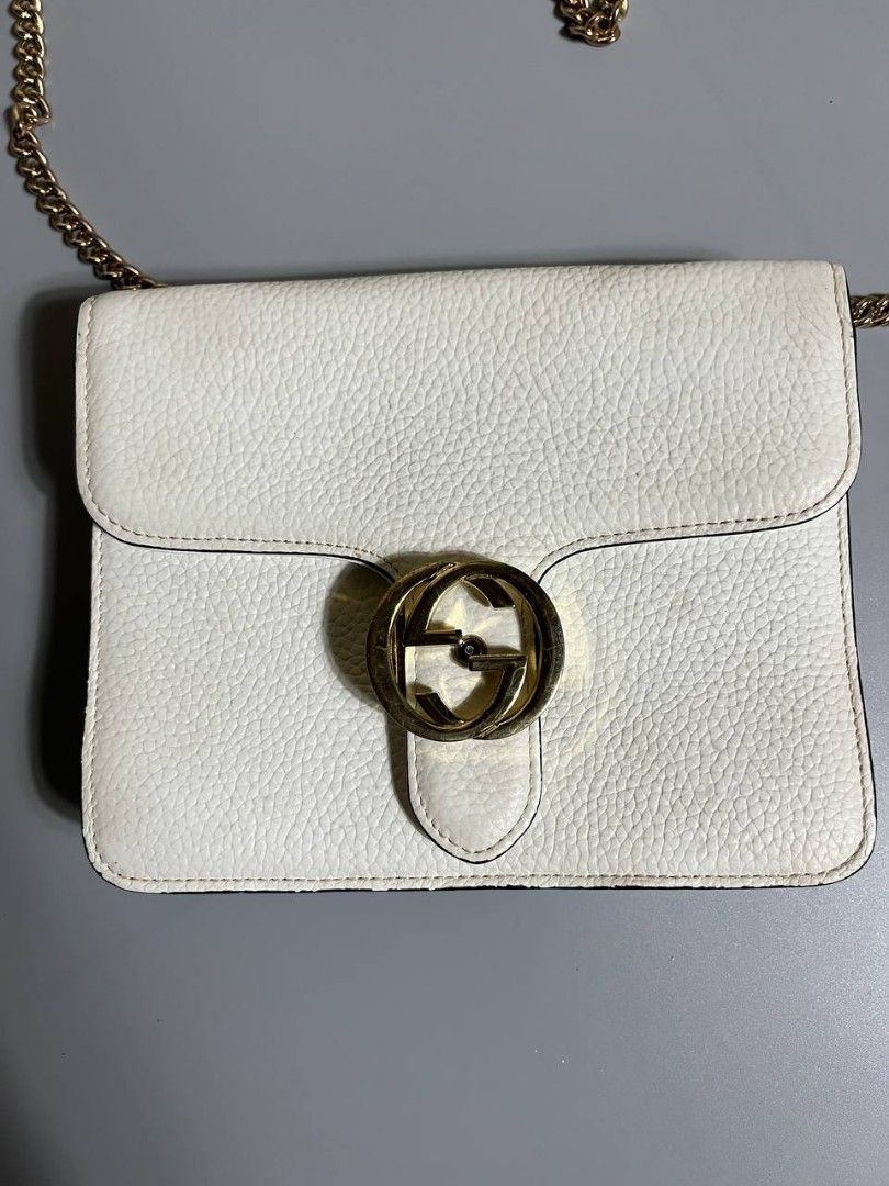 Gucci Marmont White Leather Chain Shoulder Bag (Category: Shoulder Bags) located in Lucena. Submitted by sth.archvl (Listing ID 1451700579, Image 2). Description: Good condition Issue sign of usage and minimal rubs in sling Complete tags Measurements Width: 8 inches Length: 6.5 inches .