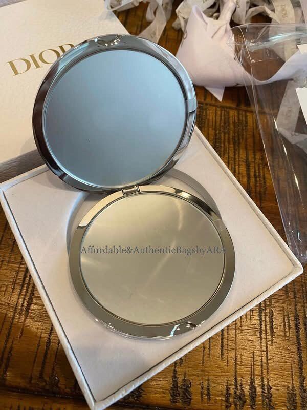 GWP CD TIGER PRINT COMPACT MIRROR (Category: Makeup) located in Daet. Submitted by ecassenluxuries (Listing ID 1451790936, Image 2). Description: 📌 FIXED PRICE ALREADY ▫️Authentic Dior GWP compact mirror ▫️Iconic tiger print design ▫️Comes with original CD paper bag ▫️Clear, high-quality mirror for touch-ups ▫️Chic and portable accessory ✅ All items are guaranteed 💯% AUTHENTIC ✅ Onhand 🪧STRICTLY PAYMENT FIRST 🪄MOP (Mode of Payment ) : GCash, 