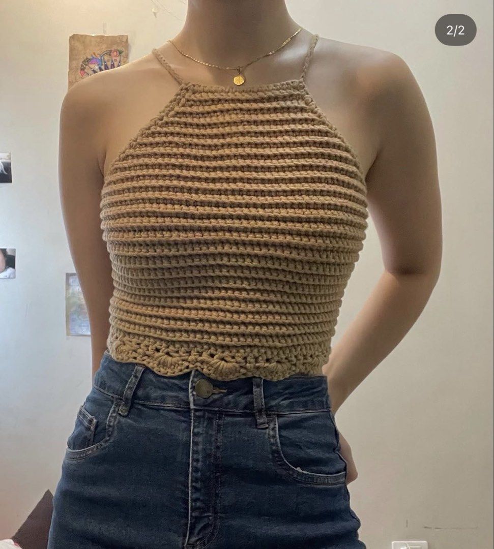 Handmade Crochet Halter Neck Crop Top (Category: Sleeveless) located in Cavite. Submitted by bobbysclutter (Listing ID 1451765363, Image 1). Description: - Brown crochet halter top - Ribbed texture all over - Scalloped hem detail - Adjustable ties at the back - Versatile for layering or wearing on its own - Personally handmade (pattern by PassionKnit Goods).