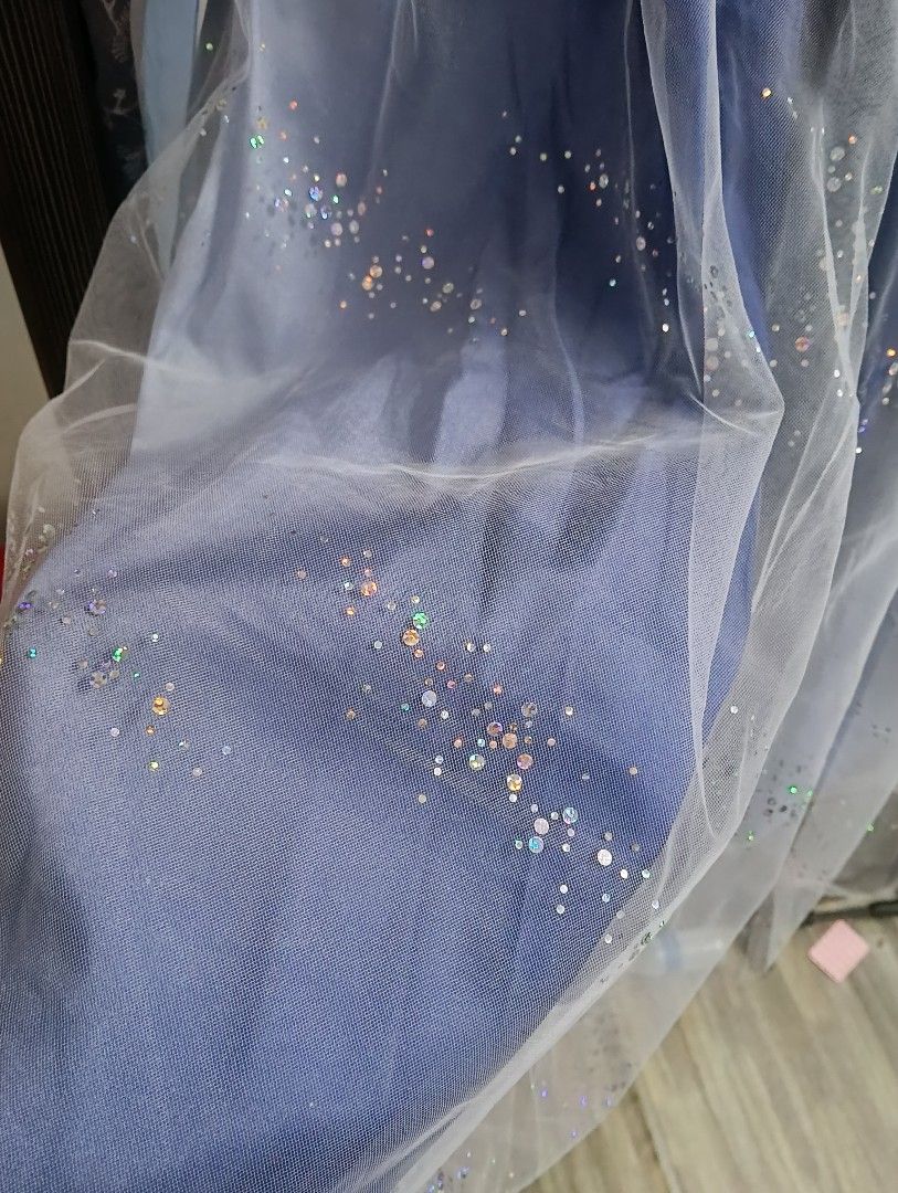 Hanfu Blue Chinese Traditional Dress Outfit Pretty (Category: Traditional & Ethnic wear) located in Merbok. Submitted by littlejeon (Listing ID 1451761304, Image 3). Description: - Beautiful blue dress with a delicate sheer, embroidered overlay. - Overlay features intricate floral patterns and scattered glitter for a magical touch. - Designed with thin straps and a flowing skirt for an elegant silhouette. - Made from light and airy fabric, perfec