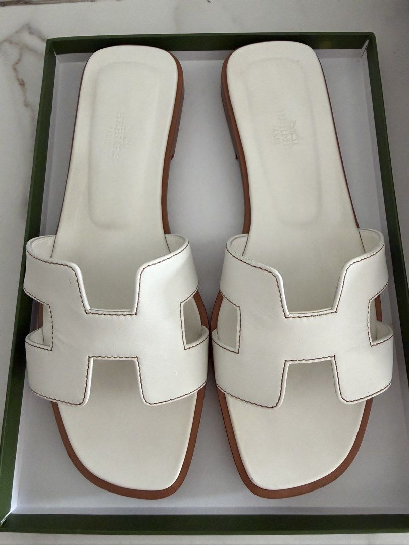 Hermes White Oran (Category: Sneakers & Footwear) located in Singapore. Submitted by bzbee (Listing ID 1451761663, Image 1). Description: Full set with receipt.