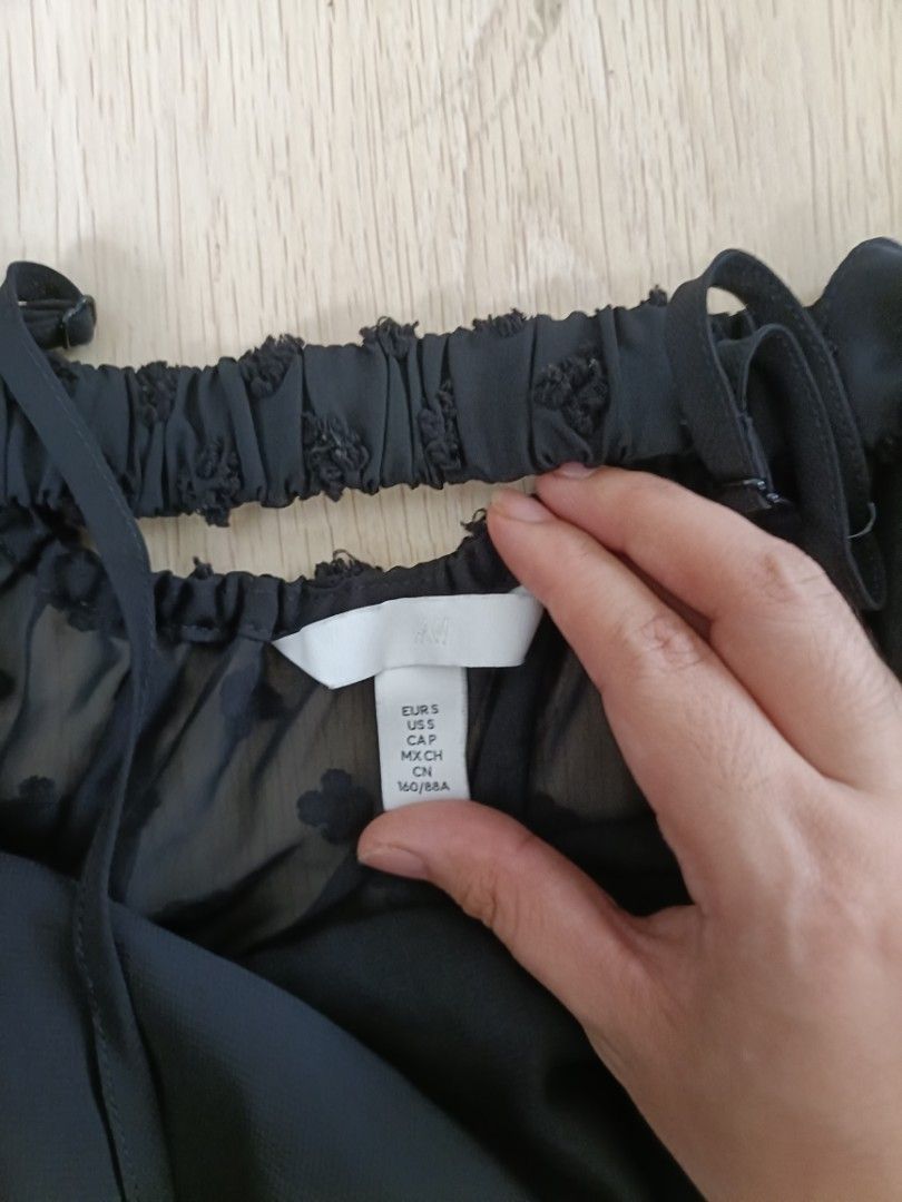 H&M Black Sheer Plumeti Strappy Top (Category: Sleeveless) located in Bacoor. Submitted by Miss_Chuch0521 (Listing ID 1451786211, Image 2). Description: Brand: H&M Size: Can fit S-M Condition: Like new never used RFS: Declutter MOP: Gcash / Bank Transfer MOD: Lalamove / J&t, no meetups or pickups Loc: Bacoor, Cavite.