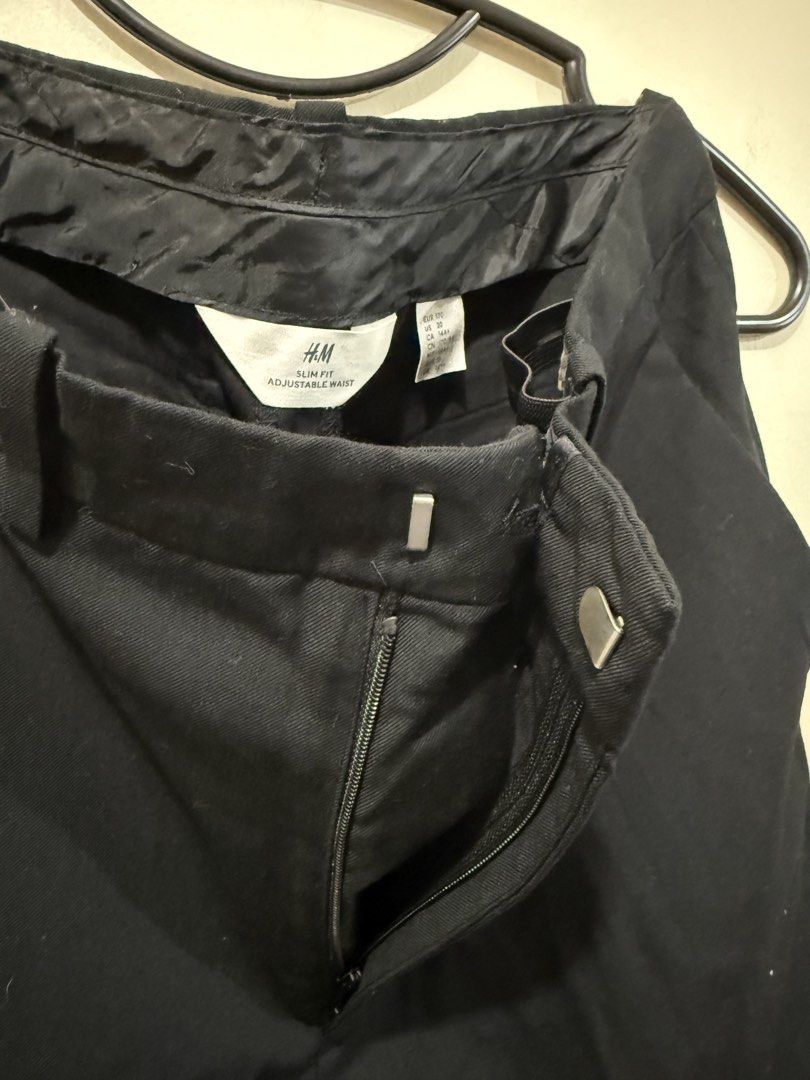 H&M Black Trouser/Slacks (Category: Babies & Kids Fashion) located in Taguig. Submitted by _decluttermomma_ (Listing ID 1451882994, Image 3). Description: Preloved H&M Slim fit Trouser/Slacks Pockets on both side Rear pockets are design only Adjustable waist Size posted on photo (9-11 years old) Used once 💵 250.