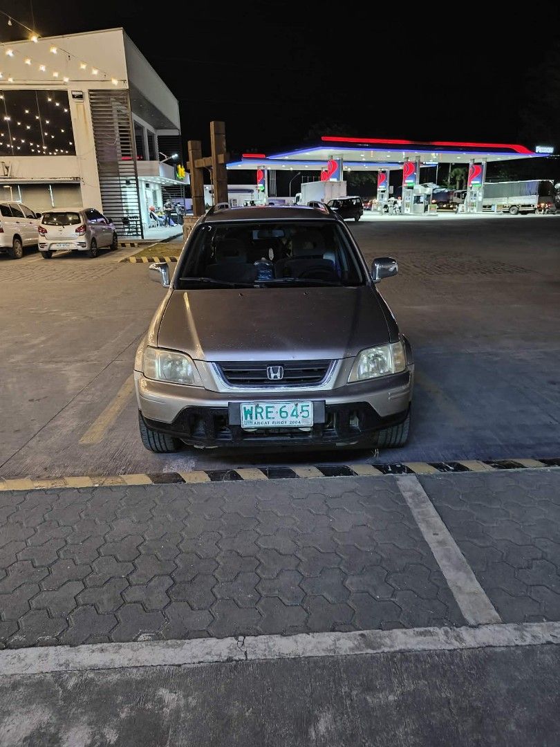 Honda CR-V 2.0 (A) (Category: Used Cars) located in Santa Cruz. Submitted by .rx-78-2 (Listing ID 1451705617, Image 1). Description: Issues: passenger seatbelt not working deep scratches and stains on paint and rims no roof rail cover repaired side mirror (driver side) automatic windows not working properly rear wiper not working registration expired May 2026 Repairs done: Transmission rebuild Sep 2021 Transmission support replaced Sep 2021 Engin