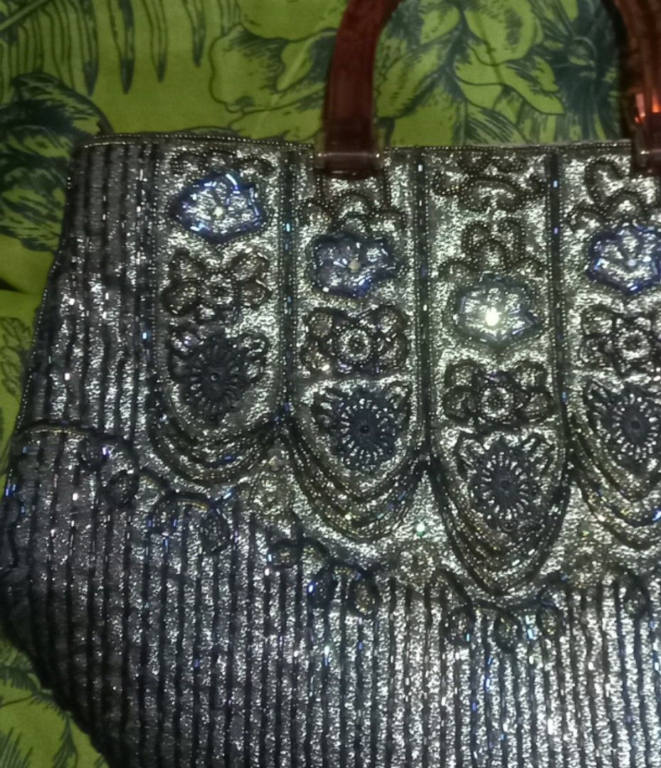 Iridescent Beaded Bag - Showa Retro Style (Category: Purses & Pouches) located in Manila. Submitted by twinklelyn03 (Listing ID 1451776102, Image 3). Description: - Eye-catching iridescent beaded exterior - Retro, Showa era-inspired design - Warm amber-colored handles - Unique vintage statement piece - Adds a distinct retro touch to any outfit see photos for details pm sa sure buyer only thank you so much po!.
