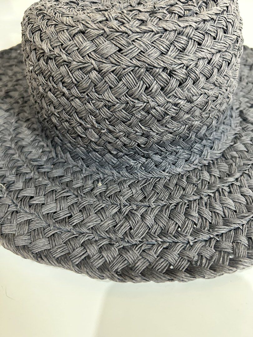 Italian Woven Straw Sun Hat (Category: Hats & Beanies) located in Paranaque City. Submitted by meowlingpersian (Listing ID 1451733273, Image 3). Description: - Handmade Italian wide-brim sun straw hat in denim blue (label was removed together with denim blue silk hat band) - 54 to 56 size - Perfect for sunny days, offering excellent sun protection. - Features an intricate and detailed weave. - Classic style that complements various outfits. - Ide