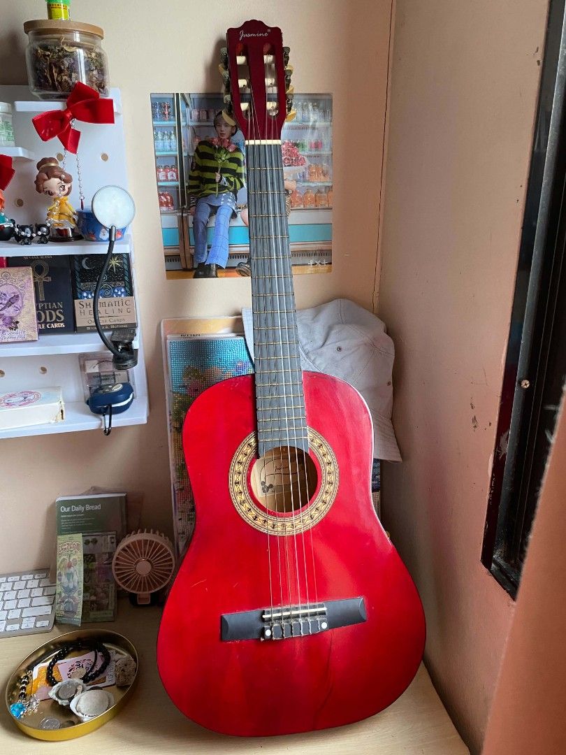 Jasmine Red Classical Guitar (Category: Musical Instruments) located in Cavite. Submitted by 4leafcolover (Listing ID 1451808904, Image 3). Description: Selling my beautiful red Jasmine classical guitar with guitar stand, bag, and picks - Good for beginners - Nylon strings - lady owned - rfs: need funds for medical bills - mod: lalamove or moveit (shouldered by buyer) - mop: maribank (qr payment) .