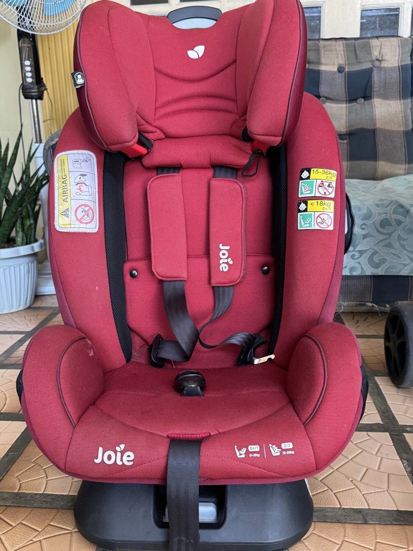 Joie Car Seat - Red (Category: Car Seats) located in Makati City. Submitted by prille (Listing ID 1451781936, Image 3). Description: - very light use , bought it 14k. selling half the price - Joie car seat in vibrant red. - Suitable for two weight ranges: 0-18kg and 15-36kg. - Features adjustable straps for a secure fit. - Adjustable headrest for growing comfort. - Safety labels clearly visible. - Base is included for easy installation. - Ready f