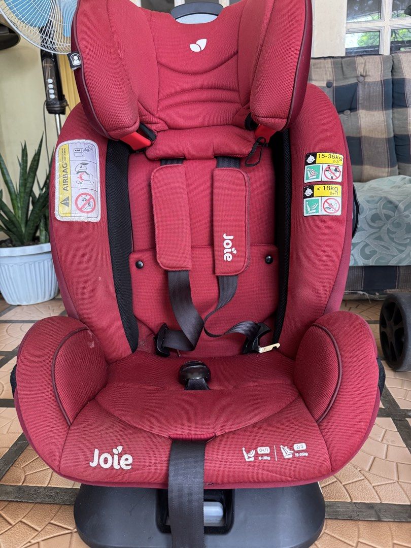 Joie Car Seat - Red (Category: Car Seats) located in Makati City. Submitted by prille (Listing ID 1451781936, Image 1). Description: - very light use , bought it 14k. selling half the price - Joie car seat in vibrant red. - Suitable for two weight ranges: 0-18kg and 15-36kg. - Features adjustable straps for a secure fit. - Adjustable headrest for growing comfort. - Safety labels clearly visible. - Base is included for easy installation. - Ready f