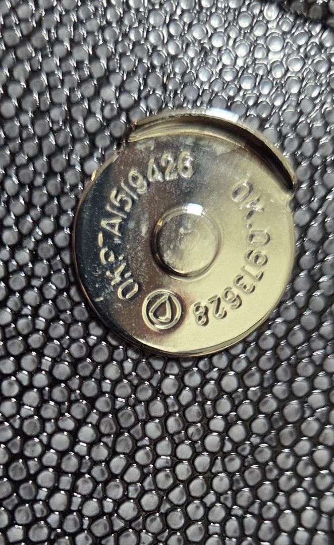 Karl Lagerfeld Paris Wallet (Category: Luxury Bags & Wallets) located in Manila. Submitted by daddyhunt99 (Listing ID 1451779218, Image 3). Description: Black textured leather wallet on chain from Karl Lagerfeld Paris. Magnetic snap closure. Inside has card slots and a zippered compartment. Chain and leather strap. Great for essentials..