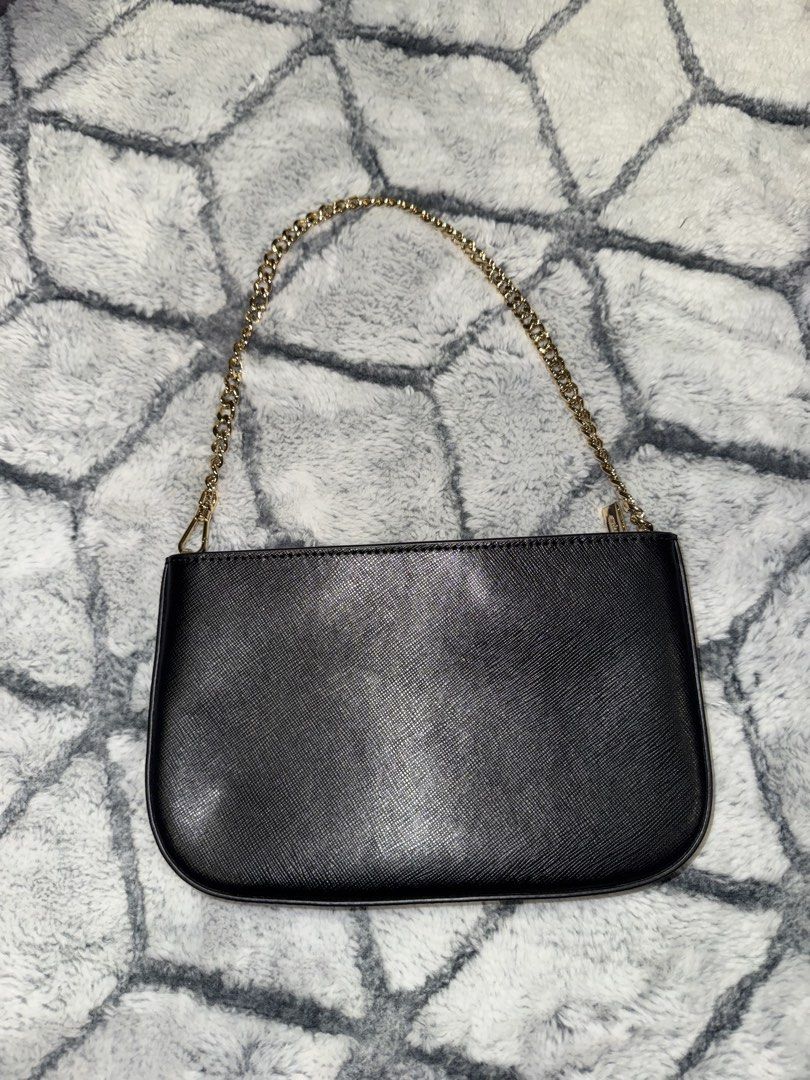 Kate Spade Pochette Bag (Category: Shoulder Bags) located in Quezon City. Submitted by trichrox (Listing ID 1451733669, Image 2). Description: Kate Spade Madison Lily Pochette.