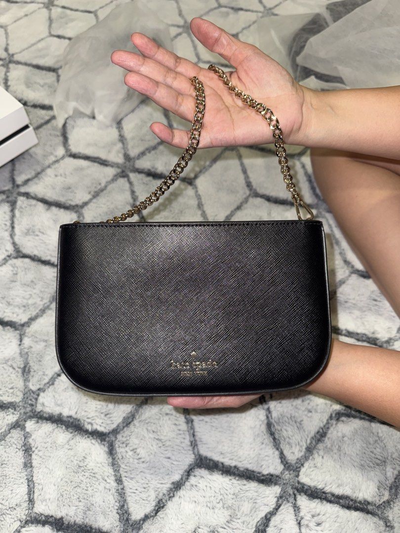 Kate Spade Pochette Bag (Category: Shoulder Bags) located in Quezon City. Submitted by trichrox (Listing ID 1451733669, Image 1). Description: Kate Spade Madison Lily Pochette.