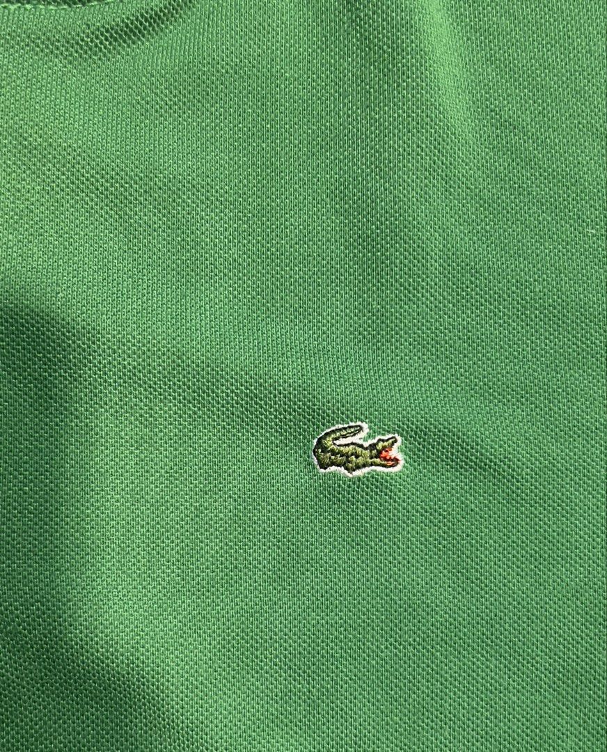 Lacoste Green Polo Shirt Size 40 (Category: Others Tops) located in Manila. Submitted by keilonz (Listing ID 1451869646, Image 3). Description: Classic green Lacoste polo shirt with iconic crocodile logo. Short sleeves, two-button placket, comfortable material. Perfect for casual or sporty style. RFS: Clearing out my closet Concern: Unsure if authentic .