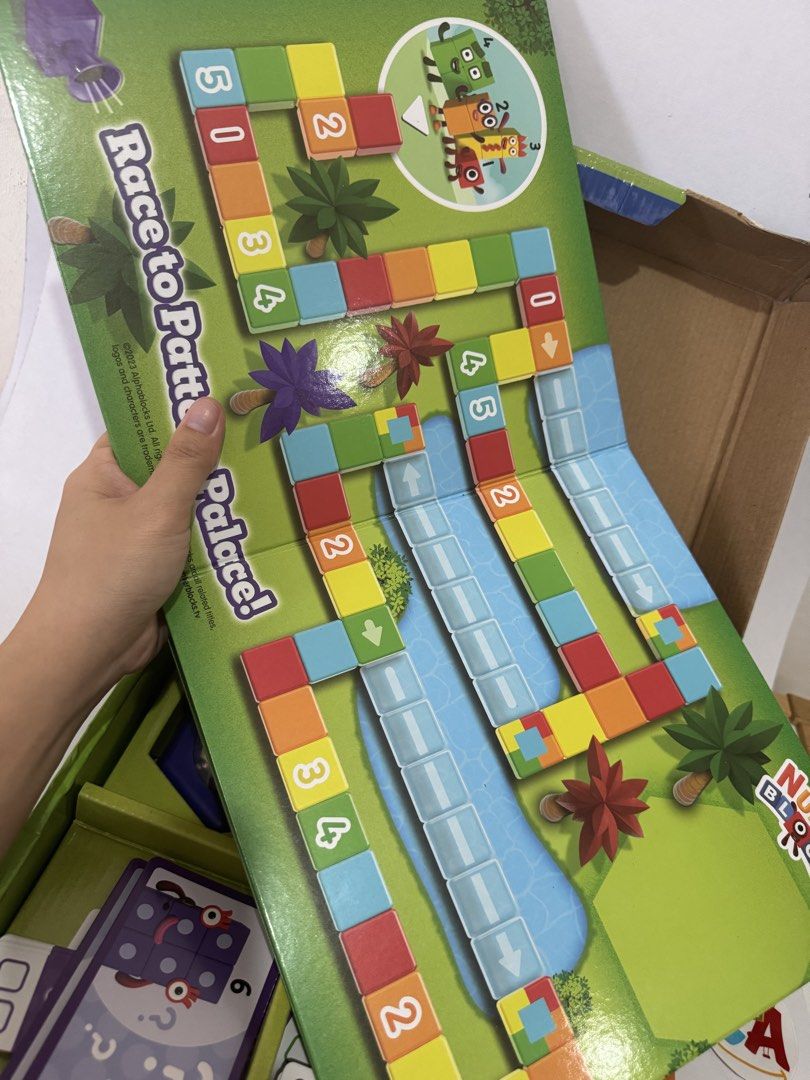 Learning Resources Numberblocks Race to Pattern Palace Game (Category: Educational & Learning Toys) located in Imus. Submitted by ca_readandroll (Listing ID 1451725774, Image 3). Description: Learning Resource_Race to Pattern Palace 🏷️ P700 🍃Content condition: Excellent used condition, missing 1 green tile, perfectly playable, max of 3 same color tile lang need per pattern 🍂Box : Damaged.