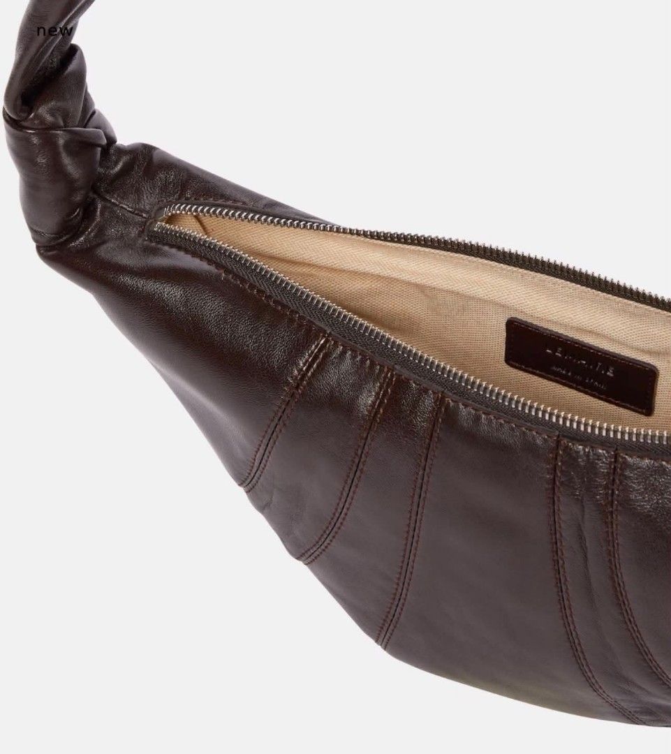 Lemaire Croissant Bag Small (Category: Luxury Bags & Wallets) located in Quezon City. Submitted by adalineonlineshop (Listing ID 1451837487, Image 3). Description: Lemaire Croissant Bag Small issue inner lining need to be clean.
