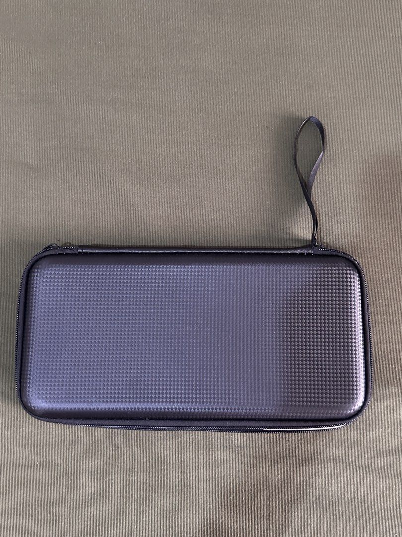 Logitech Wireless BT Keyboard K380 Storage Bag (Category: Computer Keyboard) located in Taguig. Submitted by graceeeee. (Listing ID 1451734599, Image 3). Description: - Hard shell case specifically designed for your Logitech K380 keyboard. - Can fit Magic Keyboard A3203 (see pic) - Provides excellent protection against bumps, drops, and scratches. - Includes a convenient strap for easy carrying and portability. - Features an internal mesh pocket 