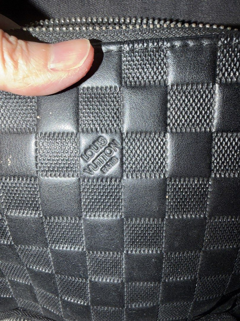 Louis Vuitton Damier Graphite Sling Bag (Category: Luxury Bags & Wallets) located in Cainta. Submitted by emcyo (Listing ID 1451721826, Image 2). Description: - Authentic Louis Vuitton sling bag - Classic Damier Graphite pattern - Made in France - Adjustable strap for comfortable wear - Secure main compartment with zip closure - Convenient front zip pocket - Ideal for everyday use Please manage your expectations. Some minor scratches. Bag alone o