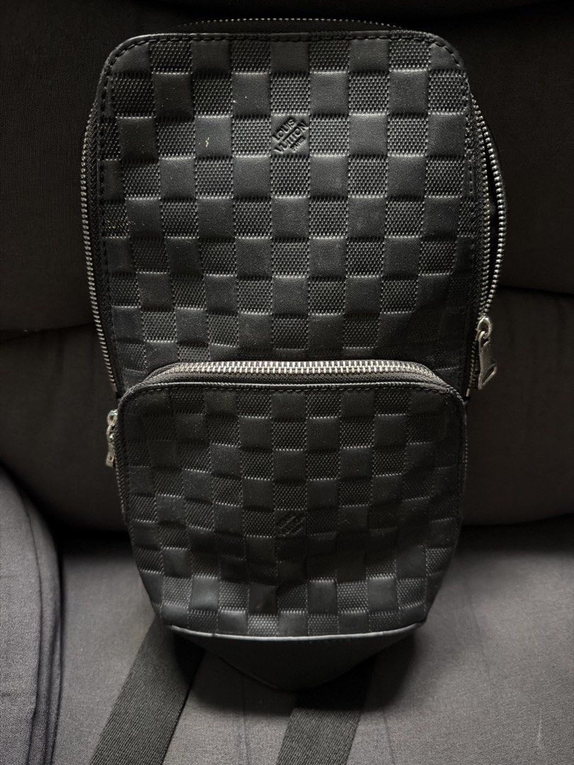 Louis Vuitton Damier Graphite Sling Bag (Category: Luxury Bags & Wallets) located in Cainta. Submitted by emcyo (Listing ID 1451721826, Image 1). Description: - Authentic Louis Vuitton sling bag - Classic Damier Graphite pattern - Made in France - Adjustable strap for comfortable wear - Secure main compartment with zip closure - Convenient front zip pocket - Ideal for everyday use Please manage your expectations. Some minor scratches. Bag alone o