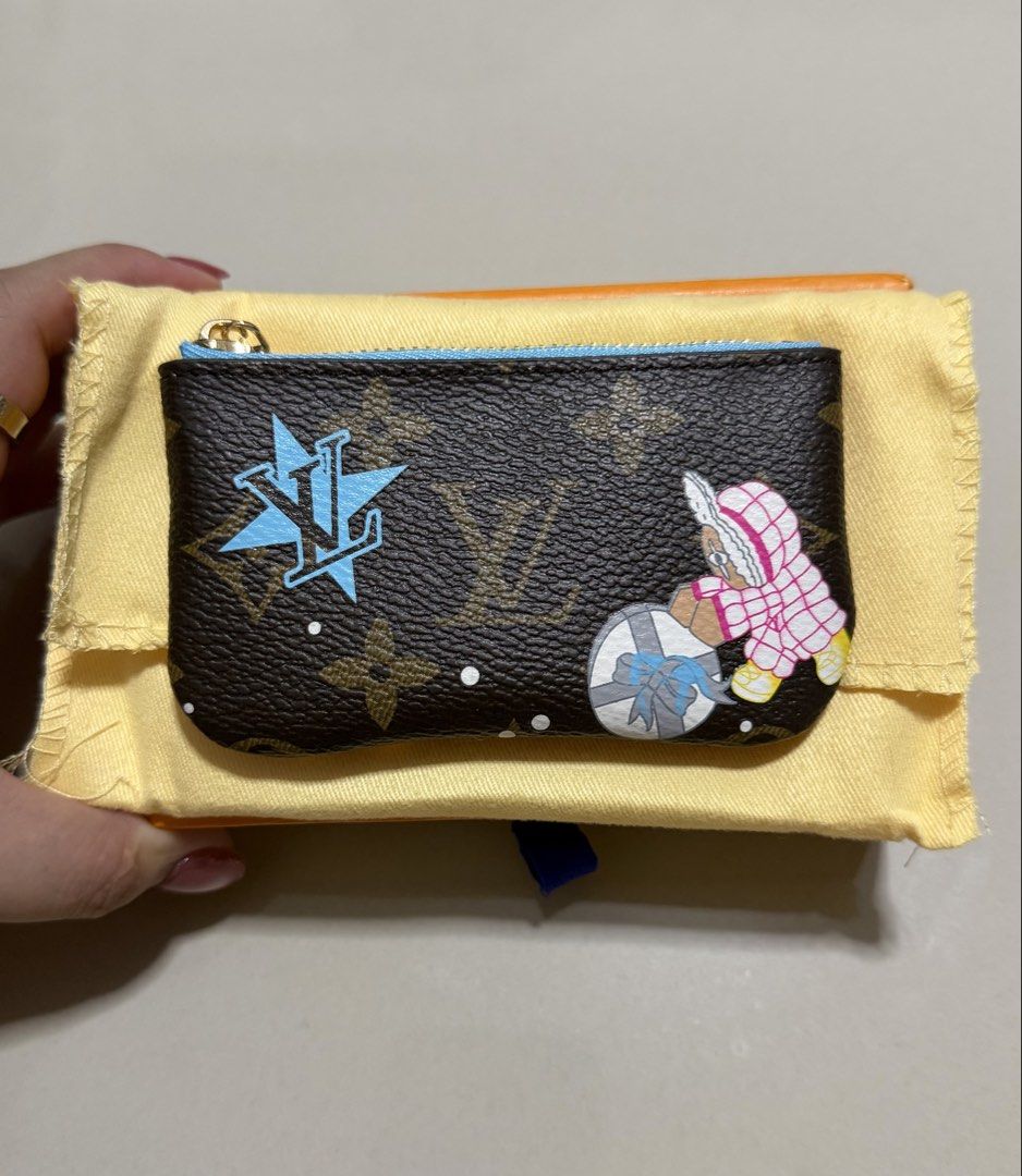 Louis Vuitton Monogram Mini Pouch (Category: Luxury Bags & Wallets) located in Pasig City. Submitted by dancieaa03 (Listing ID 1451862217, Image 2). Description: - Louis Vuitton Mini Pouch - Classic Monogram Canvas - Adorable Polar Bear & Festive Charm Design - Includes Louis Vuitton Box and Dust Bag - Ideal for Coins, Cards, or Small Essentials - Secure Zipper Closure - Blue Interior Lining This pouch is NGA.