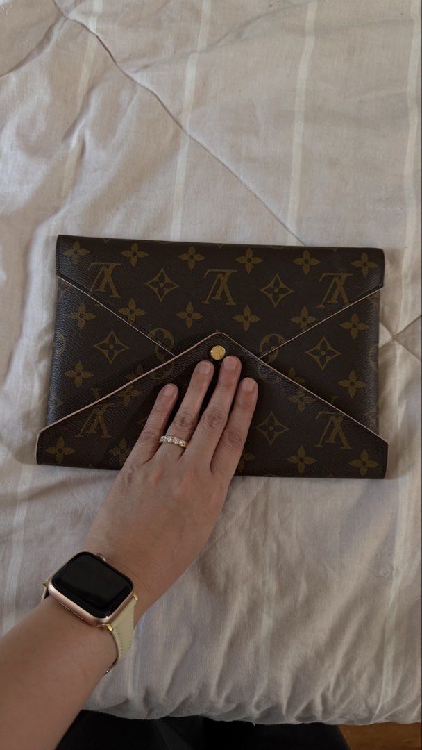 Louis Vuitton Pochette Kirigami w/ Entrupy (Category: Luxury Bags & Wallets) located in Las Pinas. Submitted by atty_katrina (Listing ID 1449925804, Image 2). Description: - Classic Louis Vuitton monogram pouch - Chic pink trim detail - Versatile envelope style with secure snap closure - Ideal for organizing essentials or as a stylish clutch -HD videos available. Pls pm your chosen messaging platform account name /number or email so i can send. .