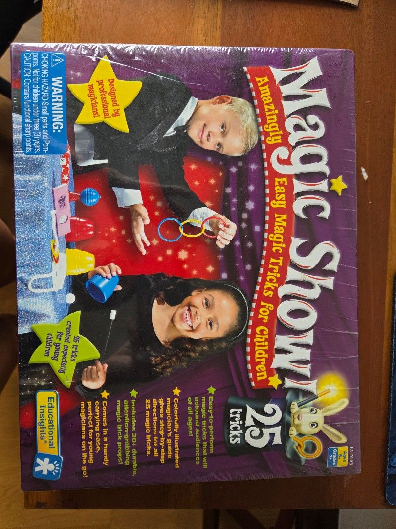 Magic Show - 25 Easy Magic Tricks for Children (Category: Educational & Learning Toys) located in Makati City. Submitted by kanixa (Listing ID 1451724346, Image 1). Description: - Amaze your audience with 25 easy-to-learn magic tricks! - Comes with over 30 durable props, including a magic wand, linking rings, and cups. - Features colorful, illustrated step-by-step instructions for easy guidance. - Includes a handy carrying case for magic shows an